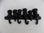 Kapstok gietijzer zes hondjes staarten als haken, Ophalen of Verzenden, Gebruikt