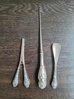 Antieke knoophaak, schoenlepel en handschoenspanner, Ophalen