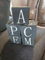5 houten blokken met letters, Ophalen
