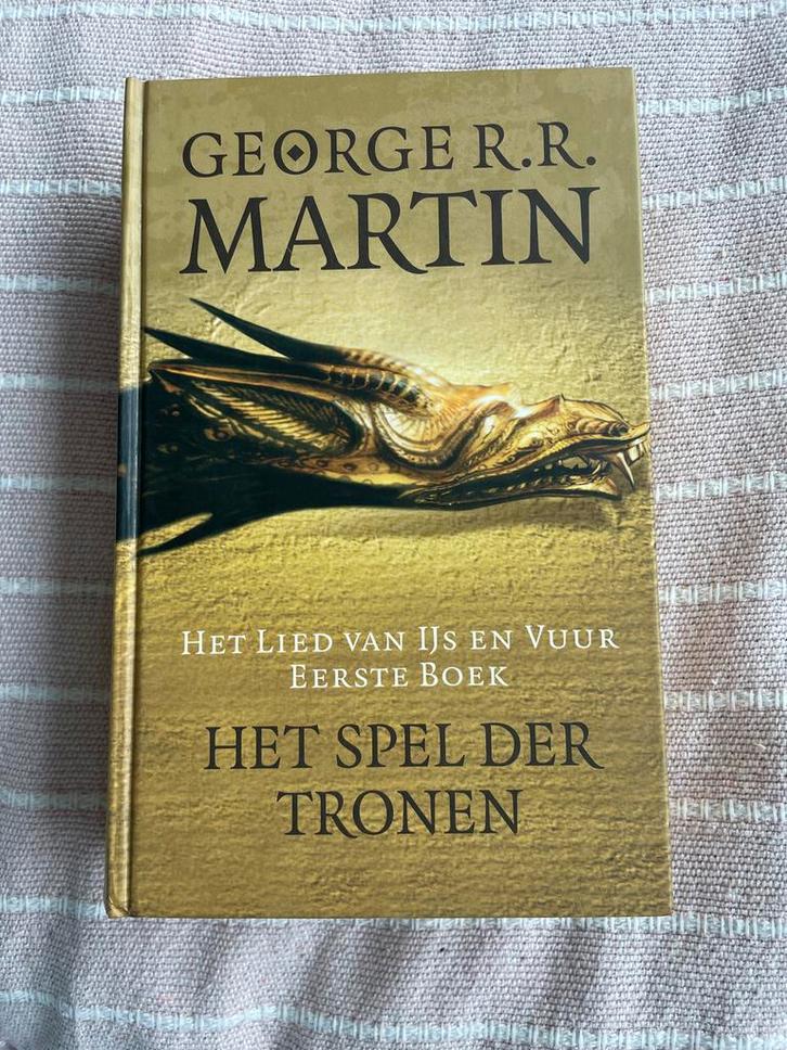 Het Spel der Tronen - George R.R. Martin, Boeken, Fantasy, Zo goed als nieuw, Ophalen of Verzenden