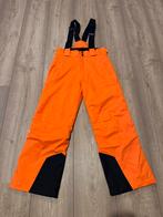 Mooie oranje skibroek Kjus mt 140, Broek, Ophalen of Verzenden, Zo goed als nieuw, Kjus