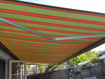 Elektrische Zonnescherm 6 meter (595cm) met afstandsbed. beschikbaar voor biedingen