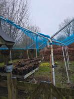 Overkapping van de moestuin, Ophalen