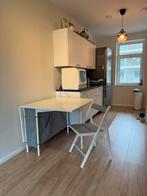 Compacte keukentafel met stoel, Ophalen