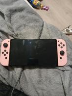 Nintendo switch oled+ gloednieuwe roze controllers + games, Met games, Met 2 controllers, Zo goed als nieuw, Switch OLED