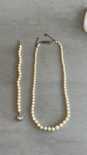 Armband en ketting parels met zilveren sluitingen beschikbaar voor biedingen