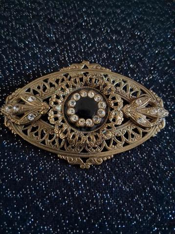 Vintage goudkleurige broche met strass steentjes beschikbaar voor biedingen
