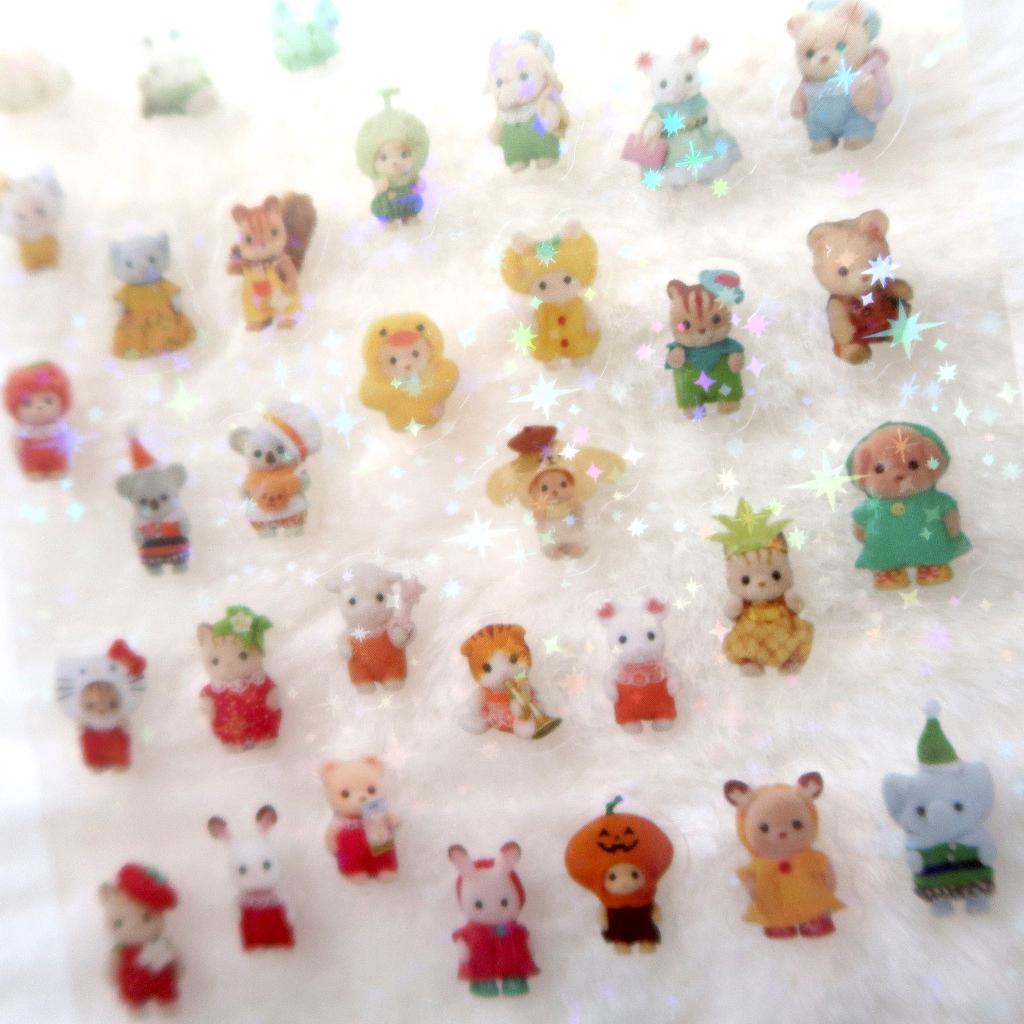 Sylvanian Family Stickervel met hologram ster afwerking, Verzamelen, Verzenden, Nieuw, Plaatje, Poster of Sticker