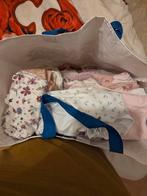 Tas vol prematuur baby kleding, Ophalen