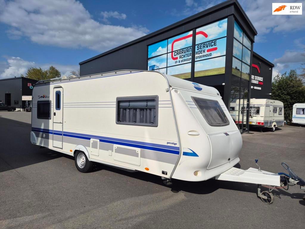 Hobby PRESTIGE 560 Kingsize Bed + Voortent Nw type 2e eig., Caravans en Kamperen, Caravans, Rondzit, Hobby, Hobby, Bedrijf