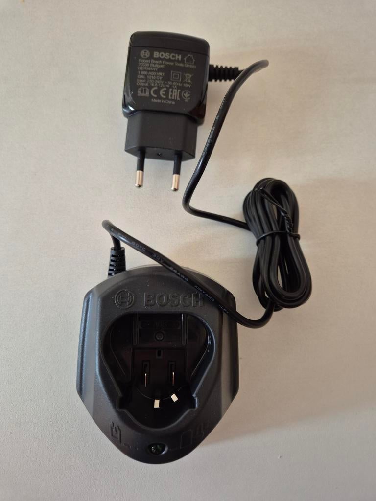 Bosch acculader met adapter, Ophalen of Verzenden, Nieuw