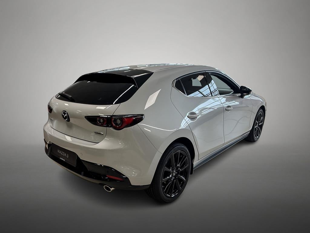 Mazda 3 2.5 e-SkyActiv-G M Hybrid 140 Homura (bj 2025), Auto's, Mazda, Voorwielaandrijving, 12 maanden, Stof, 4 cilinders