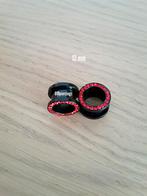 Nieuwe tunnels. Staal. Zwart. Rode steentjes. 4, 5, 6, 8 -18, Ophalen of Verzenden, Zo goed als nieuw, Staal, Oor- of Traguspiercing