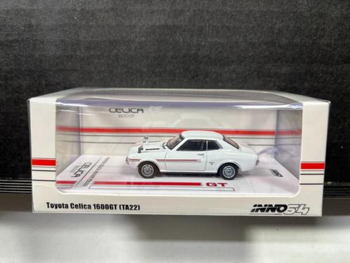 Toyota Celica 1600GT (TA22) van Inno64 1/64 wit, Hobby en Vrije tijd, Modelauto's | Overige schalen, Nieuw, Auto, Ophalen of Verzenden