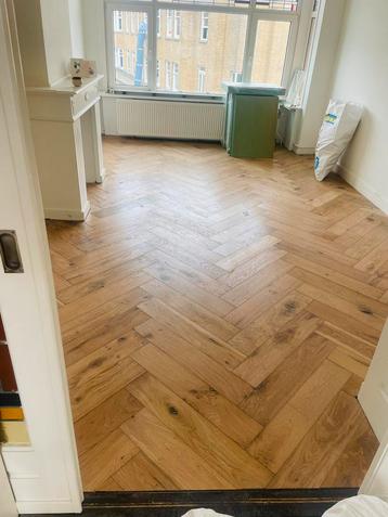 Lamel parket visgraat +/- 12m2 beschikbaar voor biedingen