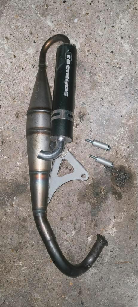 Tecnigas Next R uitlaat (Piaggio) (Terugloopuitlaat), Fietsen en Brommers, Brommers | Tuning en Styling, Nieuw, Ophalen of Verzenden