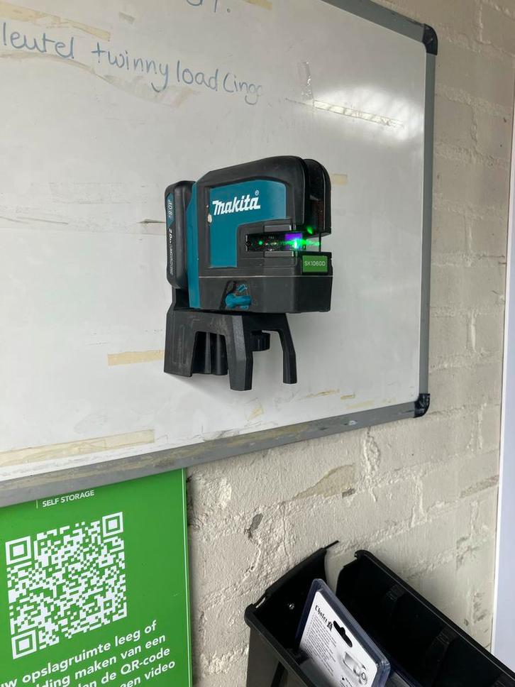 Makita SK106GD Groene Kruislijnlaser + Accu & Lader, Doe-het-zelf en Verbouw, Meetapparatuur, Gebruikt, Licht, Ophalen of Verzenden