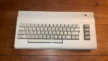 Hele nette commodore 64g inclusief voeding beschikbaar voor biedingen