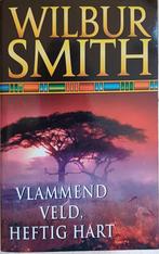 KORTING! Vlammend veld, heftig hart - Wilbur Smith, Gelezen, Wereld overig, Ophalen of Verzenden, Wilbur Smith