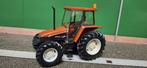 New Holland L85 Britains Siku, Hobby en Vrije tijd, Modelauto's | 1:32, Ophalen of Verzenden, Zo goed als nieuw, Tractor of Landbouw
