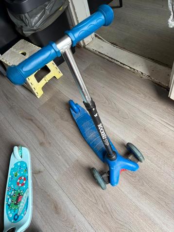 Kinderstepje met lichtjes beschikbaar voor biedingen