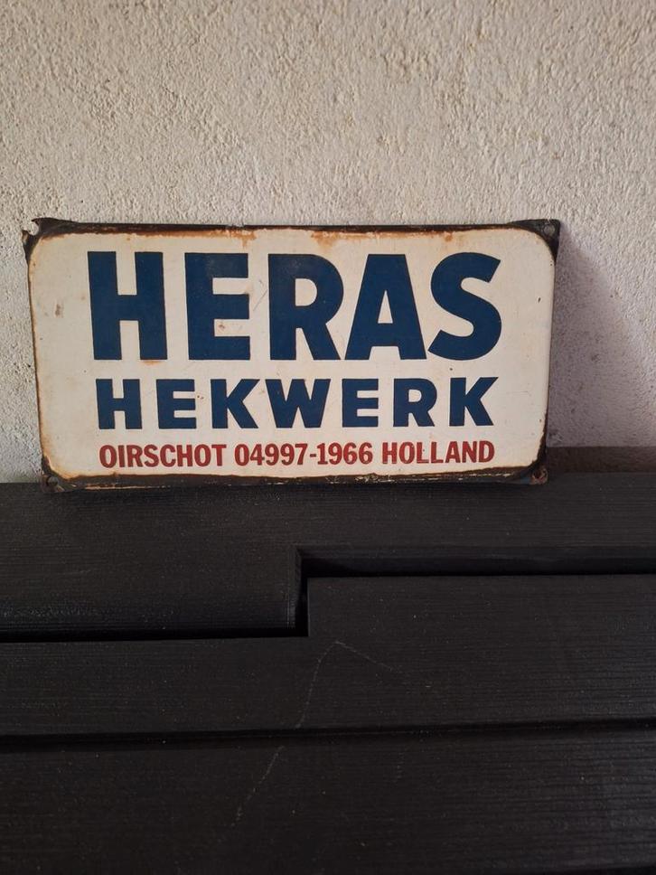 Emaille Reclamebord HERAS Hekwerk Oirschot Holland, Antiek en Kunst, Antiek | Emaille, Ophalen of Verzenden