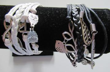 Armbanden wit en zwart beschikbaar voor biedingen