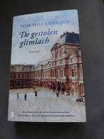 De gestolen glimlach - Tom Hillenbrand, Ophalen of Verzenden, Zo goed als nieuw