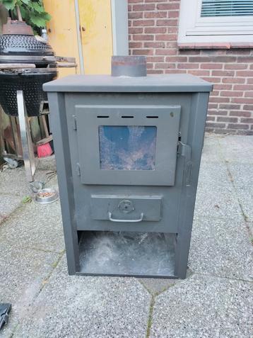 Houtkachel 5kw beschikbaar voor biedingen