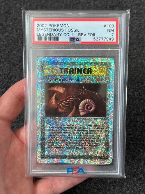 Pokémon PSA 7 Mysterious Fossil Rev. holo #109 legendary set, Hobby en Vrije tijd, Verzamelkaartspellen | Pokémon, Zo goed als nieuw