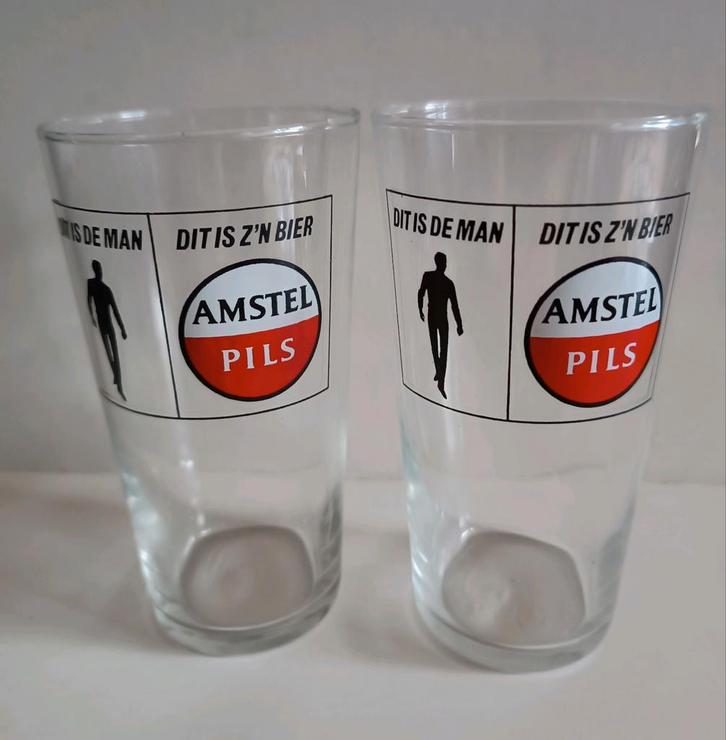 Amstel Pils Bierglazen - 'Dit is de man Dit is zijn bier', Huis en Inrichting, Keuken | Servies, Gebruikt, Glas of Glazen, Overige stijlen