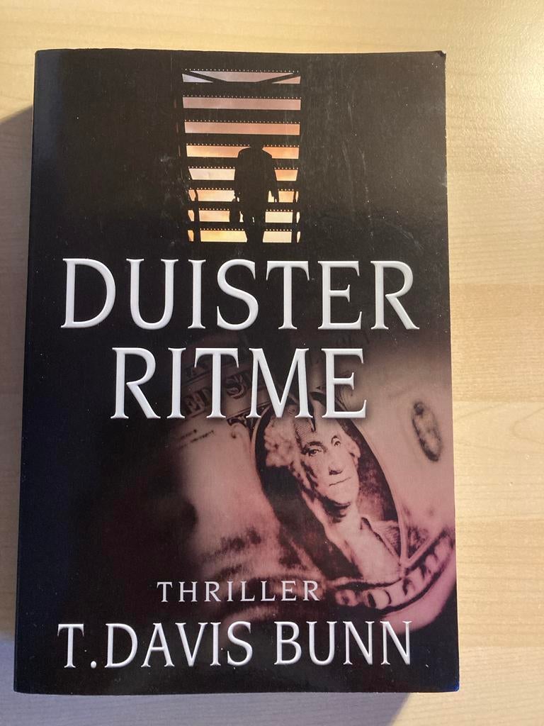 Duister Ritme - T. Davis Bunn Thriller, Boeken, Ophalen of Verzenden, Zo goed als nieuw, Nederland