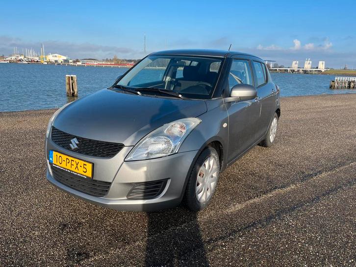 Suzuki Swift 1.2 5-D 2011 Grijs APK tot 2027, 1e eigenaar, Auto's, Suzuki, Particulier, Swift, Airbags, Airconditioning, Isofix