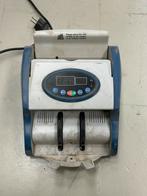 Geldtelmachine met UV-controle, Ophalen