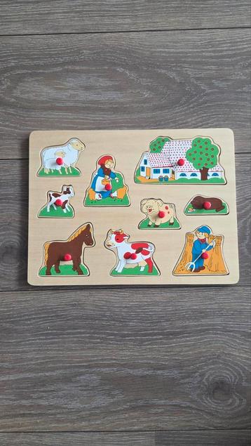 Houten noppenpuzzel boerderij beschikbaar voor biedingen