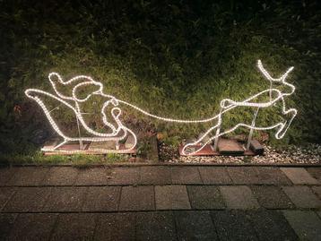Kerstman met rendier beschikbaar voor biedingen