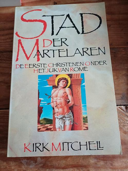 Stad der Martelaren - Kirk Mitchell, Boeken, Godsdienst en Theologie, Gelezen, Christendom | Katholiek, Christendom | Protestants