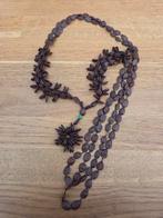 Bruine ketting met hanger van zaden, Gebruikt, Bruin, Ophalen of Verzenden, Overige materialen