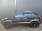 Hyundai Tucson 2.0i Active climatronic trekhaak (bj 2005), 4 cilinders, Zwart, Origineel Nederlands, Bedrijf