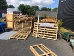 stapels houten pallets, Ophalen
