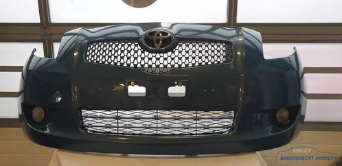 Voorbumper Yaris II Toyota licht blauw origineel gebruikt 20, Auto-onderdelen, Carrosserie en Plaatwerk, Bumper, Toyota, Voor
