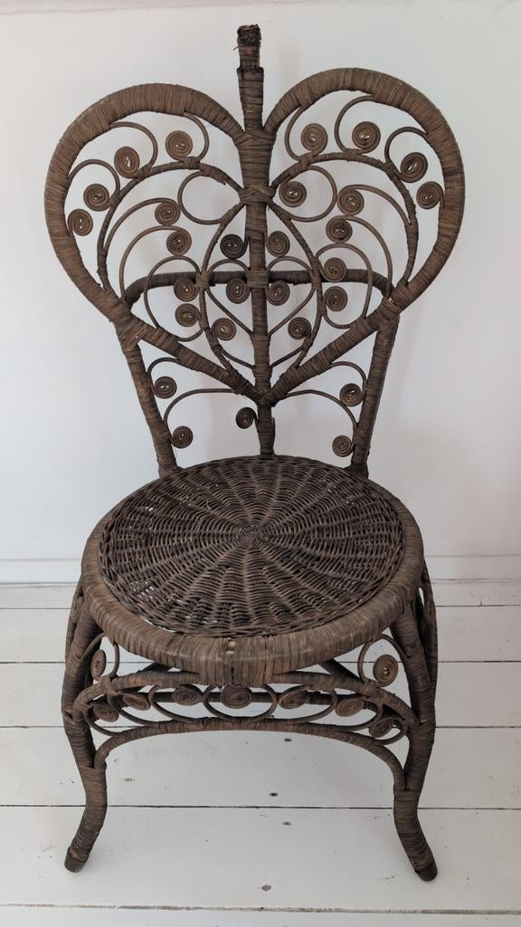 Rotan stoel met hartvormige rugleuning, Ophalen
