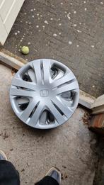 Honda Jazz wieldoppen, Ophalen