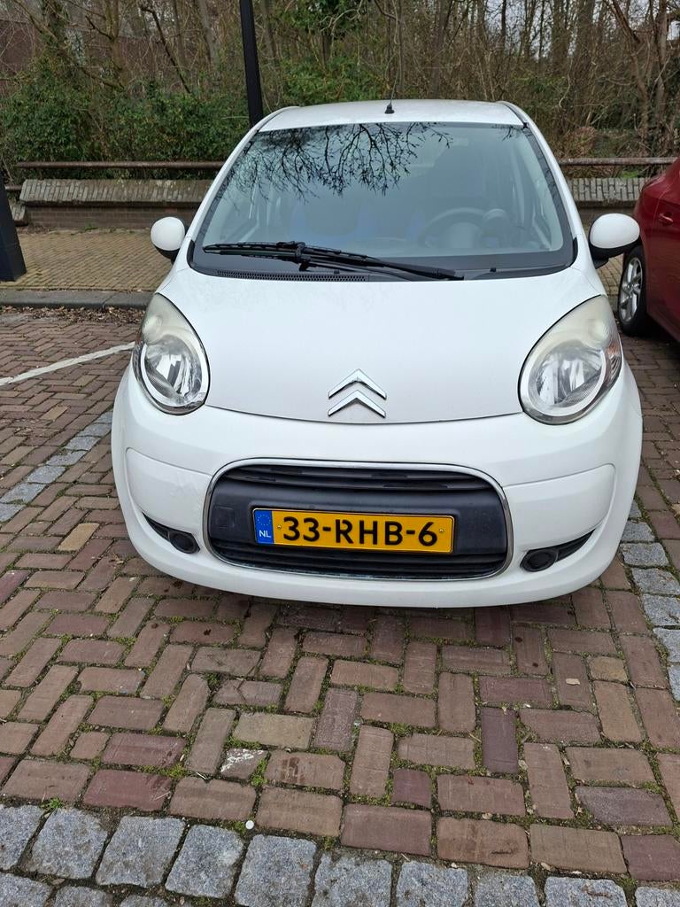 Citroën C1 1.0 5-DRS Sensodrive 2011 Wit, Auto's, Citroën, Stof, 4 stoelen, C1, Grijs