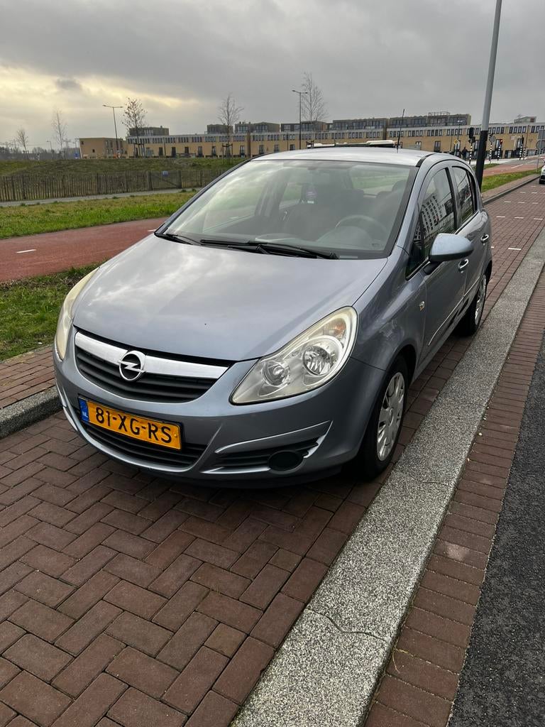 Opel Corsa 1.2-16V Enjoy Automaat, Auto's, Opel, Automaat, Stof, Zwart, Particulier