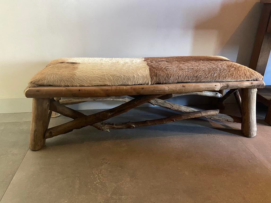 Hoffz bankje koeienhuid - zgan!, Huis en Inrichting, Ophalen, Minder dan 50 cm, Gebruikt, 125 cm of meer