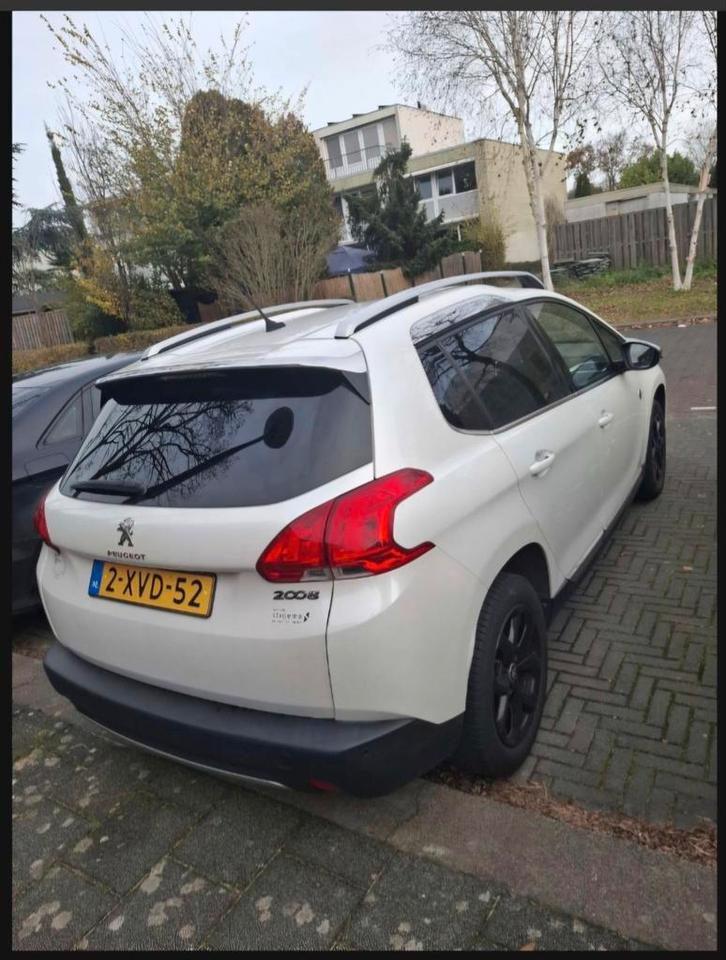 Peugeot 2008 1.2 VTI 2014 Wit, Auto's, Peugeot, Particulier, ABS, Adaptieve lichten, Airbags, Airconditioning, Bluetooth, Bochtverlichting