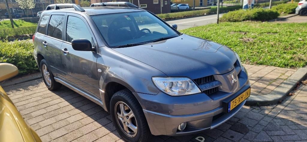 Mitsubishi Outlander 2.0 MPI 2WD 2007 Grijs, Auto's, Mitsubishi, Voorwielaandrijving, Outlander, 4 cilinders, 1415 kg