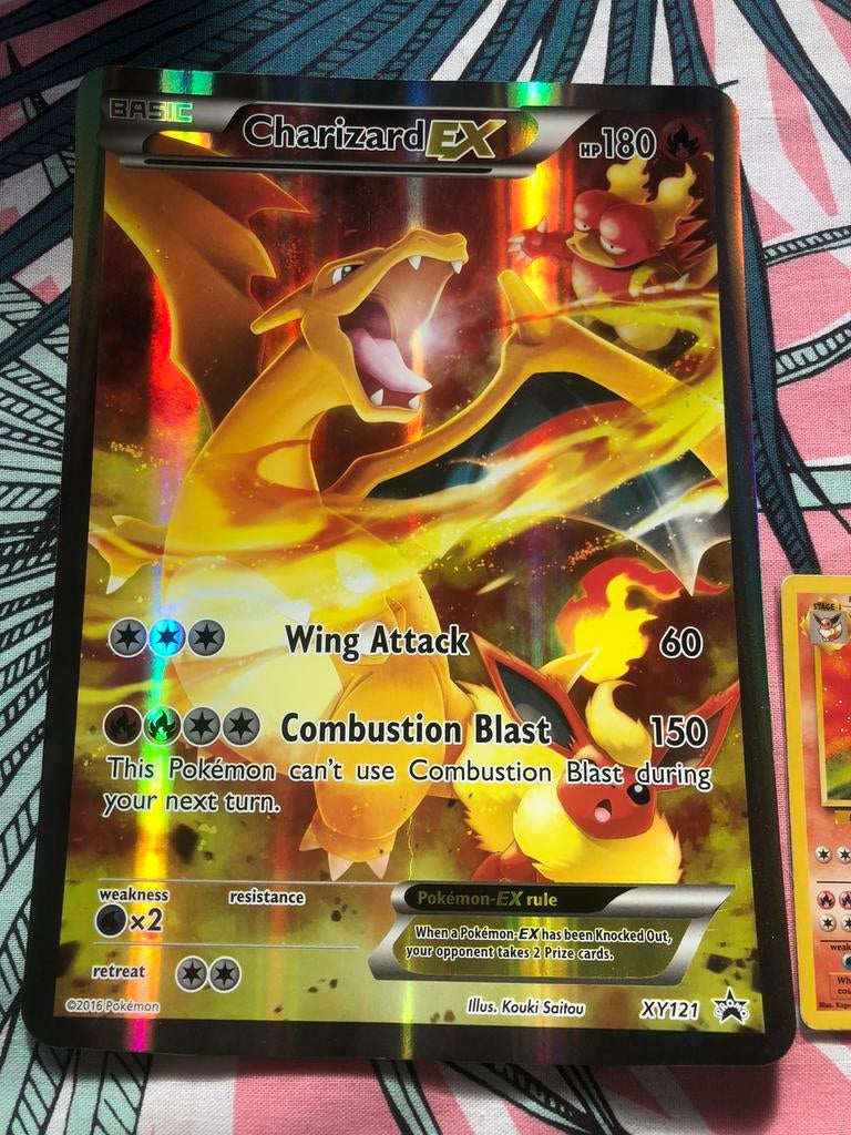 XXL Charizard promo, Hobby en Vrije tijd, Verzamelkaartspellen | Pokémon, Ophalen of Verzenden, Zo goed als nieuw