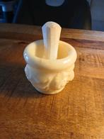 Albasten vijzel met stamper, Ophalen